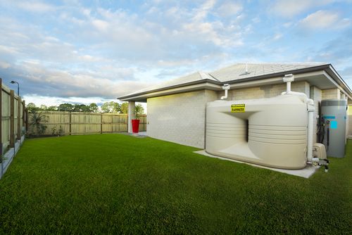 Backyard rainwater collection tanks