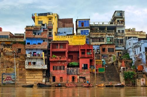 Colorful and chaotic houses on the banks of the Ganges River in India